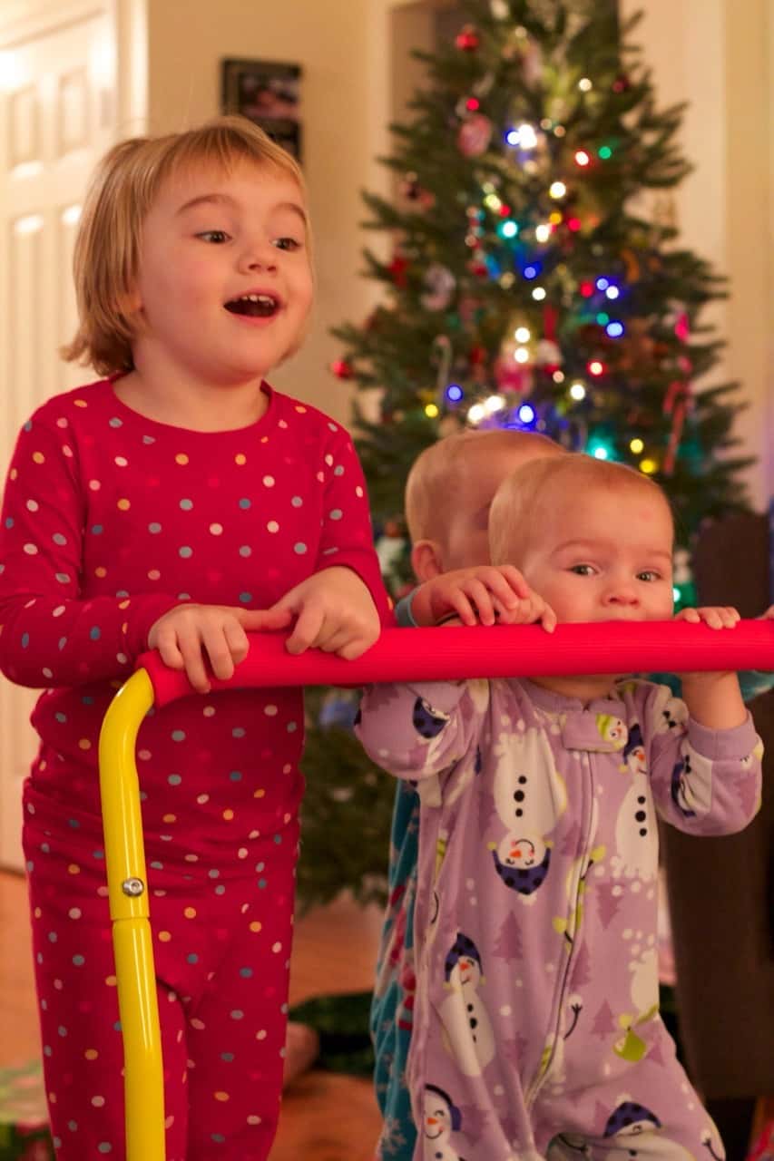 This was our best Christmas morning so far. Abby woke up first, and was surprisingly willing to let the presents sit untouched while we waited for her sisters to wake up. Josie was the second to wake, but no such luck with her. She wanted to investigate! We ended up encouraging Gwen to get out of bed so we could see what Santa brought us.

The girls had lots of fun opening their gifts, and giving gifts. The highlights were a toy train set, an indoor trampoline, some very cute animal hats and gloves, and a bright red toy monster truck for Papa, who just wanted a nice German car. (That was Abby’s gift to John. She looked at Papa’s preferred cars at the store and said they were “too grey, too blue, too boring.” She instead bought a fire truck for Josie, a camper with a beach scene for Gwen, and the monster truck for John. No sports cars for her!)

We took lots of pictures, but Tumblr only allows ten per post. (Sigh.) Christmas afternoon coming next.