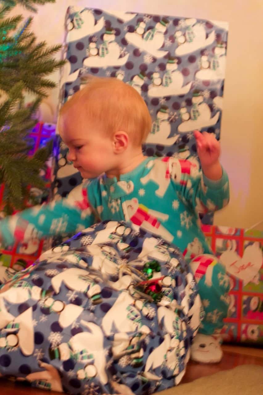 This was our best Christmas morning so far. Abby woke up first, and was surprisingly willing to let the presents sit untouched while we waited for her sisters to wake up. Josie was the second to wake, but no such luck with her. She wanted to investigate! We ended up encouraging Gwen to get out of bed so we could see what Santa brought us.

The girls had lots of fun opening their gifts, and giving gifts. The highlights were a toy train set, an indoor trampoline, some very cute animal hats and gloves, and a bright red toy monster truck for Papa, who just wanted a nice German car. (That was Abby’s gift to John. She looked at Papa’s preferred cars at the store and said they were “too grey, too blue, too boring.” She instead bought a fire truck for Josie, a camper with a beach scene for Gwen, and the monster truck for John. No sports cars for her!)

We took lots of pictures, but Tumblr only allows ten per post. (Sigh.) Christmas afternoon coming next.