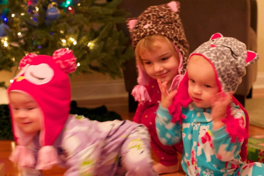This was our best Christmas morning so far. Abby woke up first, and was surprisingly willing to let the presents sit untouched while we waited for her sisters to wake up. Josie was the second to wake, but no such luck with her. She wanted to investigate! We ended up encouraging Gwen to get out of bed so we could see what Santa brought us.

The girls had lots of fun opening their gifts, and giving gifts. The highlights were a toy train set, an indoor trampoline, some very cute animal hats and gloves, and a bright red toy monster truck for Papa, who just wanted a nice German car. (That was Abby’s gift to John. She looked at Papa’s preferred cars at the store and said they were “too grey, too blue, too boring.” She instead bought a fire truck for Josie, a camper with a beach scene for Gwen, and the monster truck for John. No sports cars for her!)

We took lots of pictures, but Tumblr only allows ten per post. (Sigh.) Christmas afternoon coming next.