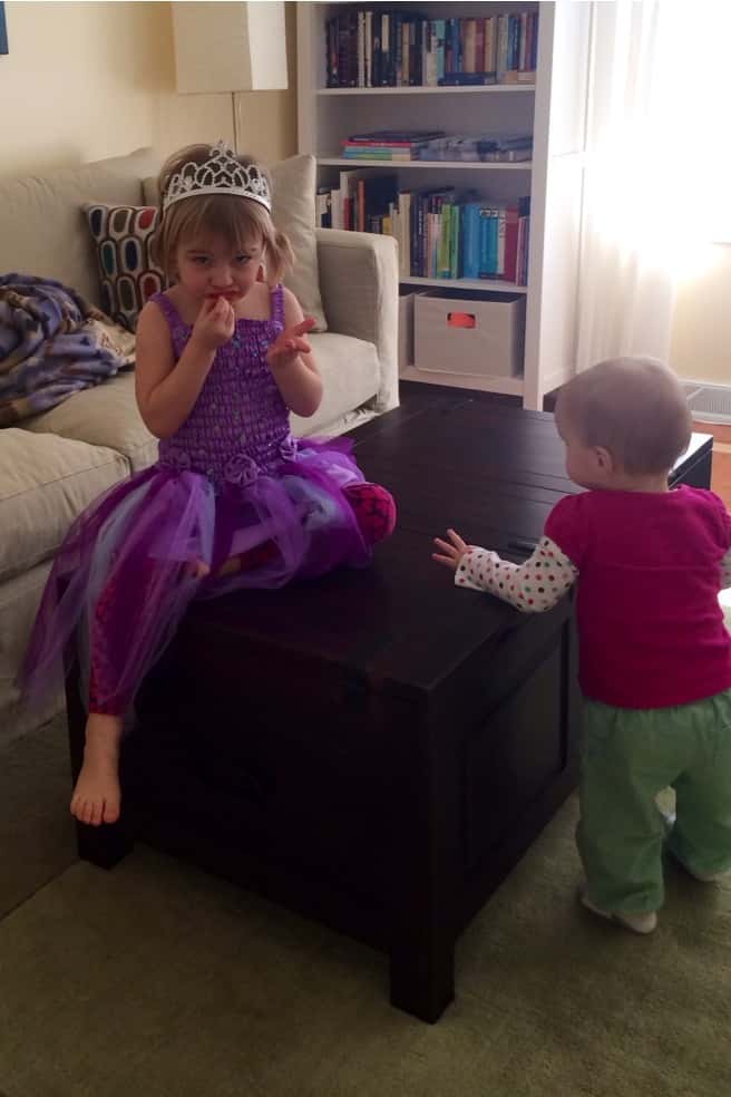 This is Abby eating the last strawberry from the full container of strawberries that all three girls devoured in under fifteen minutes. They’re not even teenagers yet!