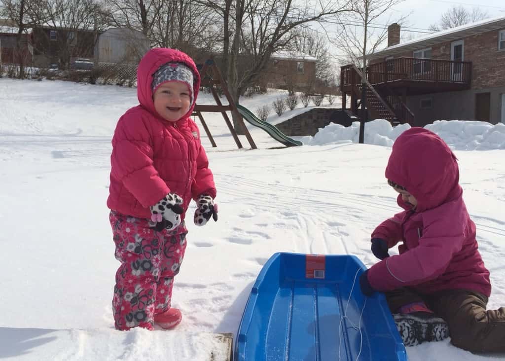 While Gwen took a long nap this morning, Josie enjoyed her first time frolicking in the snow with her big sister.
