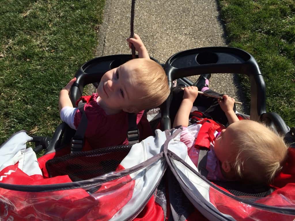 Yes, they’re sisters, but not identical, we often say. Even our walks illustrate that point. Josie likes to lean forward in the stroller, point at things, and excitedly tell me what she sees. “Dog! Car!” She only has words for a few things, but she tries. I fill in the rest. (Look Josie! A mailbox!) Gwen likes to recline and suck on her pacifier. She lets the world come to her.