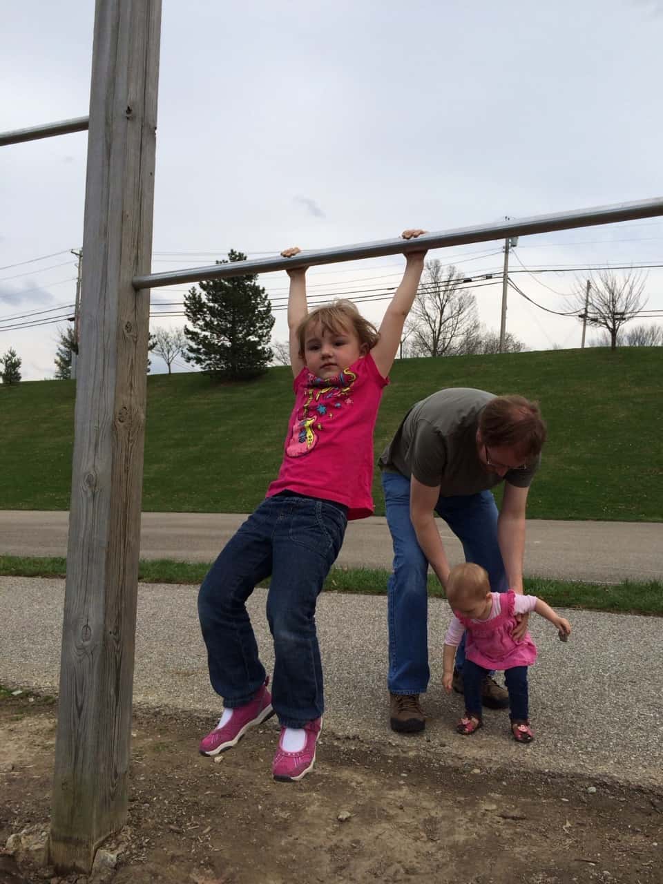 The girls and I took a walk to the park this afternoon. It was a good thing that John met us there with the van after work because they wore themselves out! I’m amazed by how far they can walk (all the way around the ½ mile path at Freedom Park) and how fearless they are on the play structures.