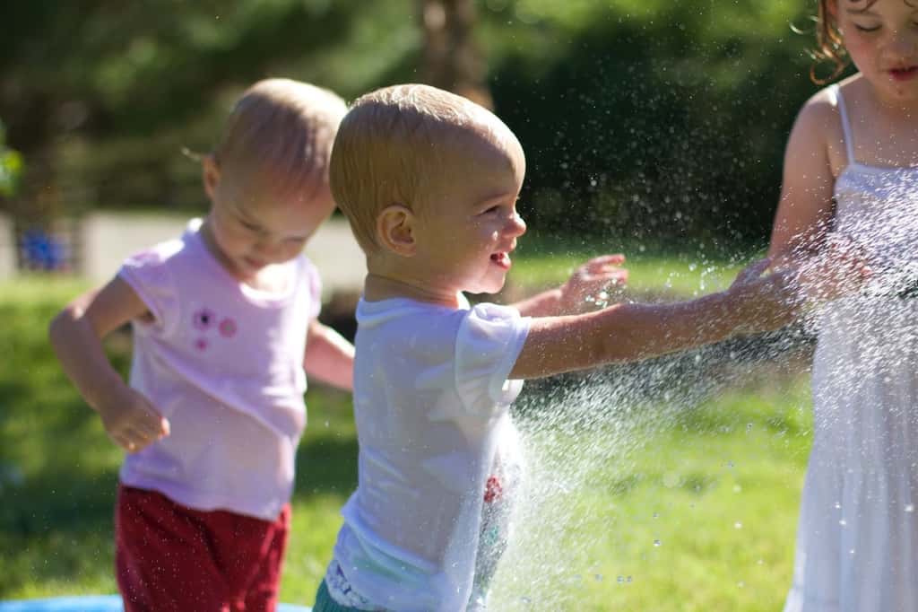 The girls, especially Gwen, had so much fun playing in the hose today. Gwen loved being sprayed in the face – just like her big sister at this age. I think we might have at least two future swimmers amongst us!