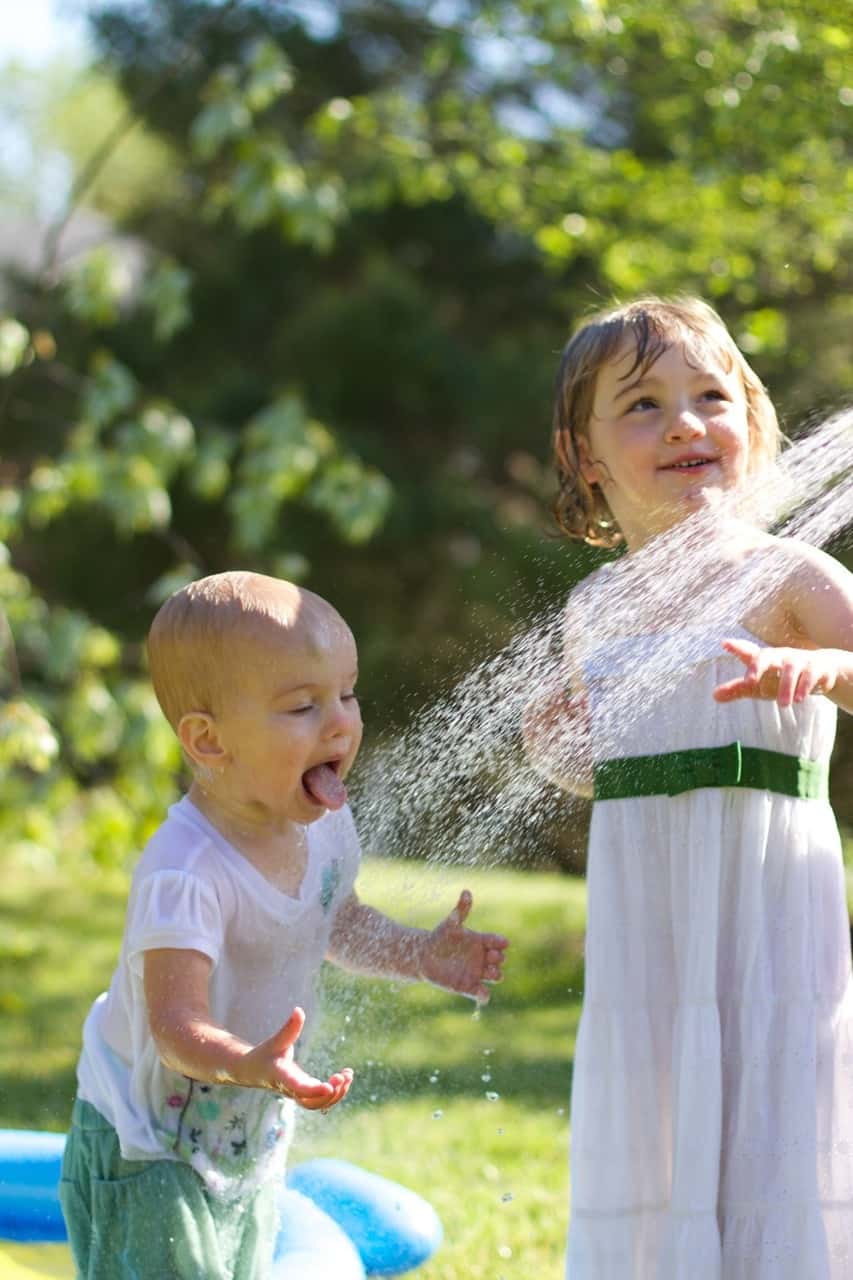 The girls, especially Gwen, had so much fun playing in the hose today. Gwen loved being sprayed in the face – just like her big sister at this age. I think we might have at least two future swimmers amongst us!