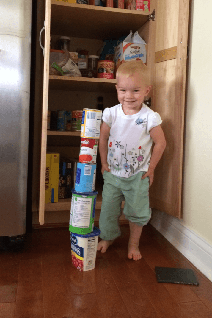 After helping to put away the groceries, Gwen decided to play. Look at that proud face!