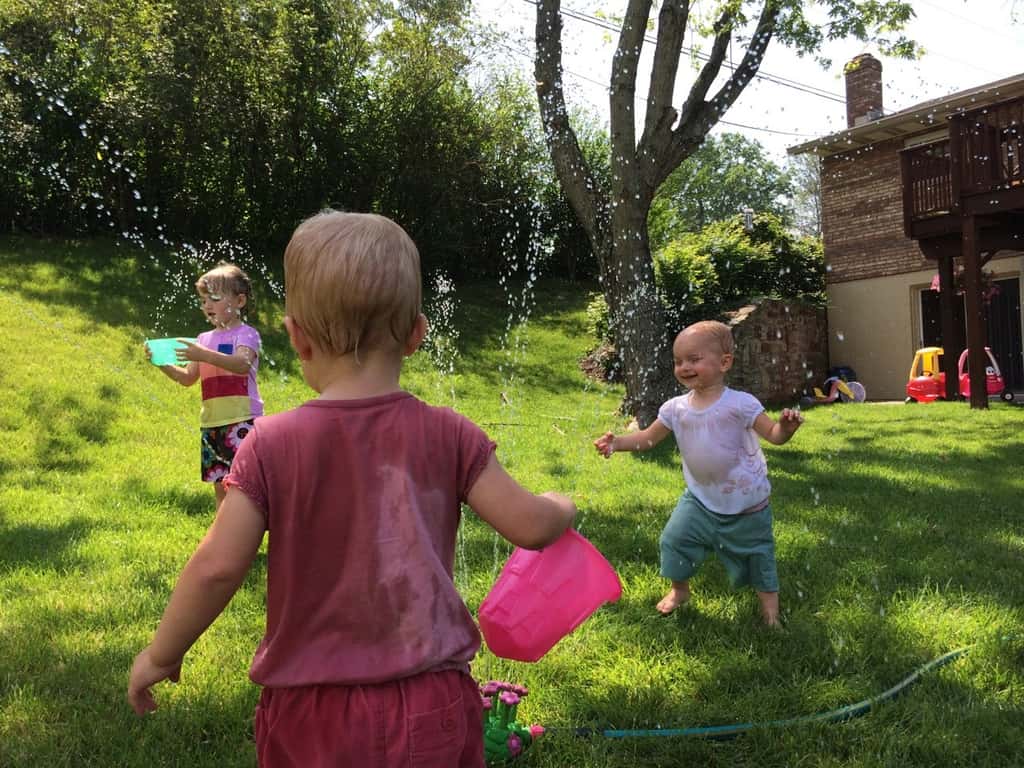 Sprinkler fun – our now daily summer pastime.