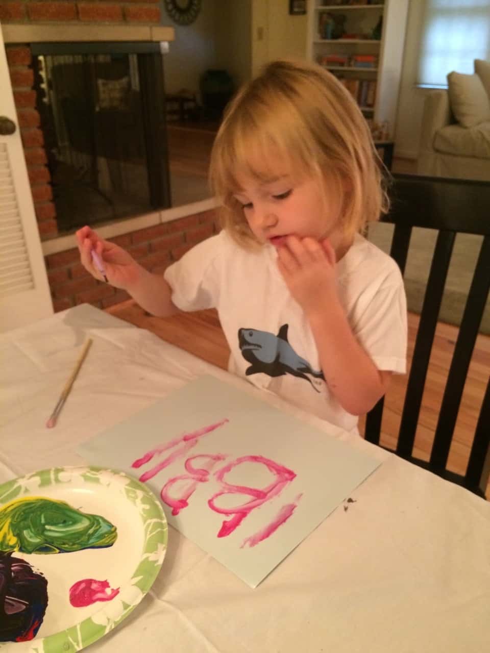 Three girls, three painting personalities… I brought out two pieces of paper for each girl. Josie was so busy mixing paint colors on her plate that she barely used one sheet. Gwen used one sheet too, but only because she was focused and determined to perfect her masterpiece. Abby, on the other hand, happily snatched up the spare paper. She needed to paint pictures for everyone!

Thirty plus minutes of painting was pretty good for little ones. If it had kept them occupied longer, I would have given them all the paper they wanted! 😉