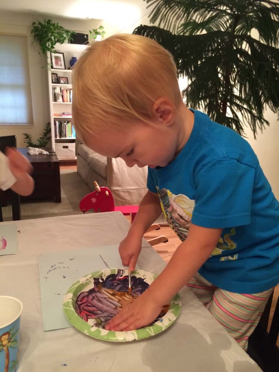 Three girls, three painting personalities… I brought out two pieces of paper for each girl. Josie was so busy mixing paint colors on her plate that she barely used one sheet. Gwen used one sheet too, but only because she was focused and determined to perfect her masterpiece. Abby, on the other hand, happily snatched up the spare paper. She needed to paint pictures for everyone!

Thirty plus minutes of painting was pretty good for little ones. If it had kept them occupied longer, I would have given them all the paper they wanted! 😉