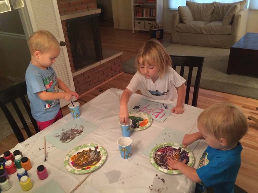 Three girls, three painting personalities… I brought out two pieces of paper for each girl. Josie was so busy mixing paint colors on her plate that she barely used one sheet. Gwen used one sheet too, but only because she was focused and determined to perfect her masterpiece. Abby, on the other hand, happily snatched up the spare paper. She needed to paint pictures for everyone!

Thirty plus minutes of painting was pretty good for little ones. If it had kept them occupied longer, I would have given them all the paper they wanted! 😉