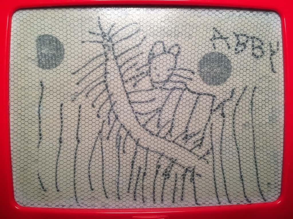 Abby’s Magnadoodle picture to me: “a kitty riding a millipede.”