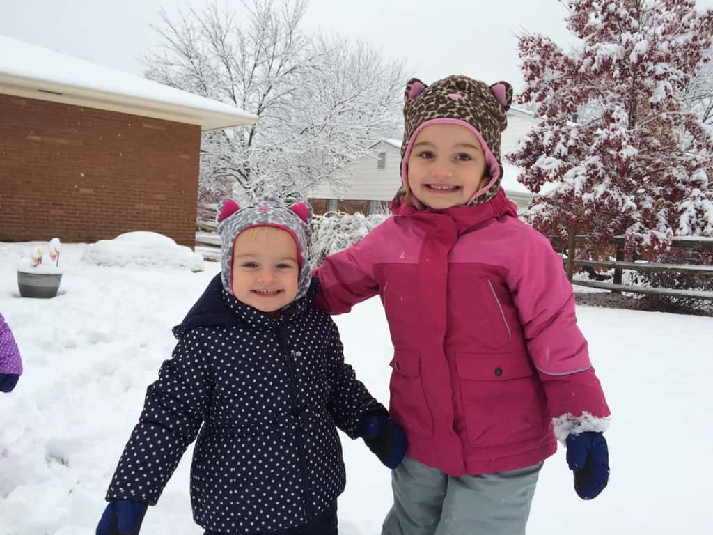 The girls played outside for an hour today. Yay for snowsuits, waterproof gloves, and snow boots. Too bad I don’t have snow boots or a snowsuit. Guess what I’m asking Santa (John) for this year.