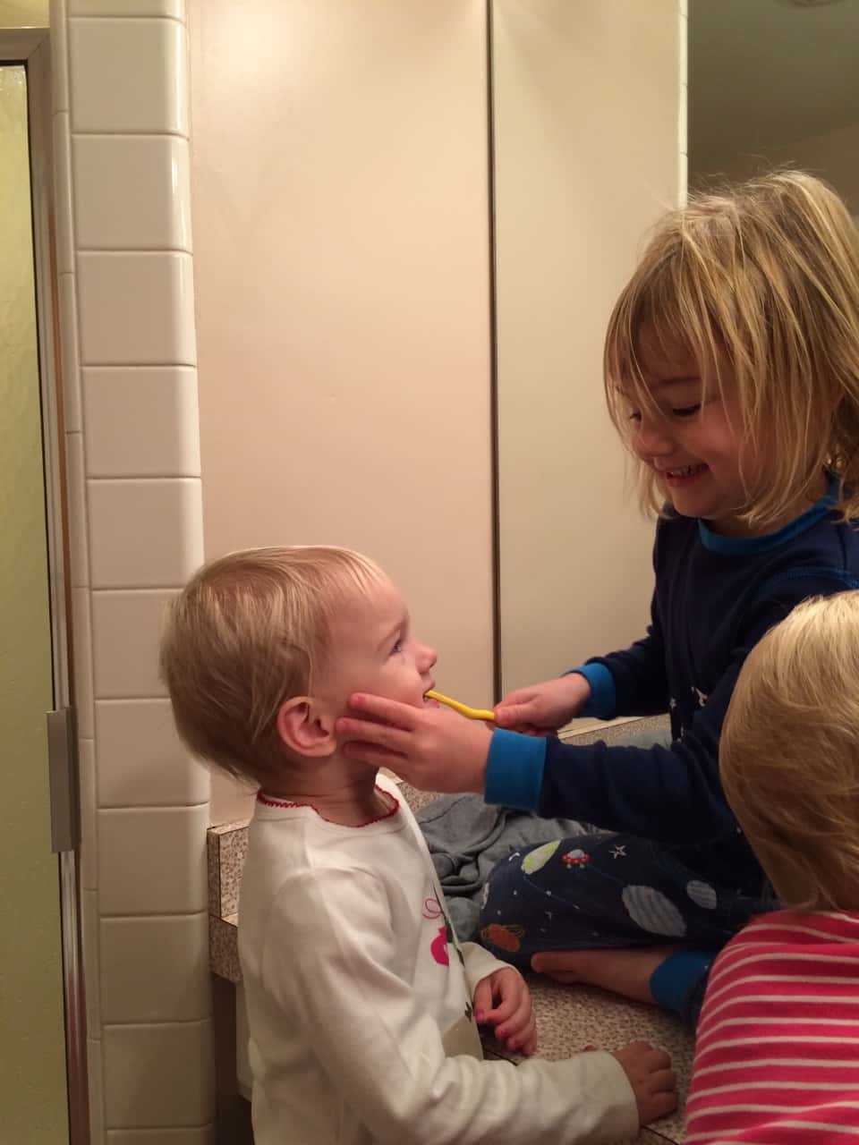 I get tears, but Gwen is all smiles when Abby brushes her teeth. I guess we have to go with what works!