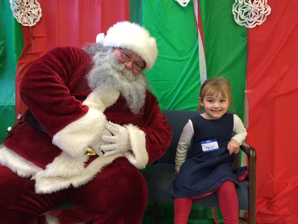 We all had a good time this morning at the Moeller Rugby Breakfast with Santa. Craft time with “Tickle Monster” Joey was especially popular. It took nearly two hours, but the girls eventually warmed up to the idea of visiting with Santa. Abby said she was going to test him to see if he was the real Santa by asking him if he had reindeer. He passed!