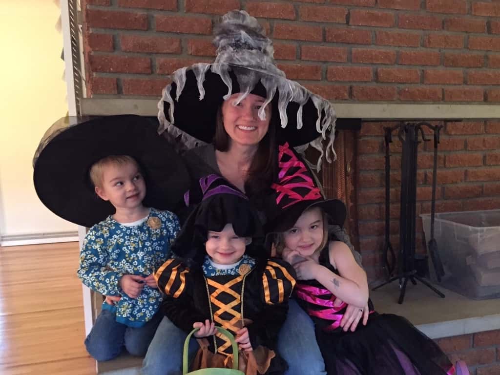 This is how you entertain kids on a gloomy day in January: bring out the Halloween costumes and count witches!