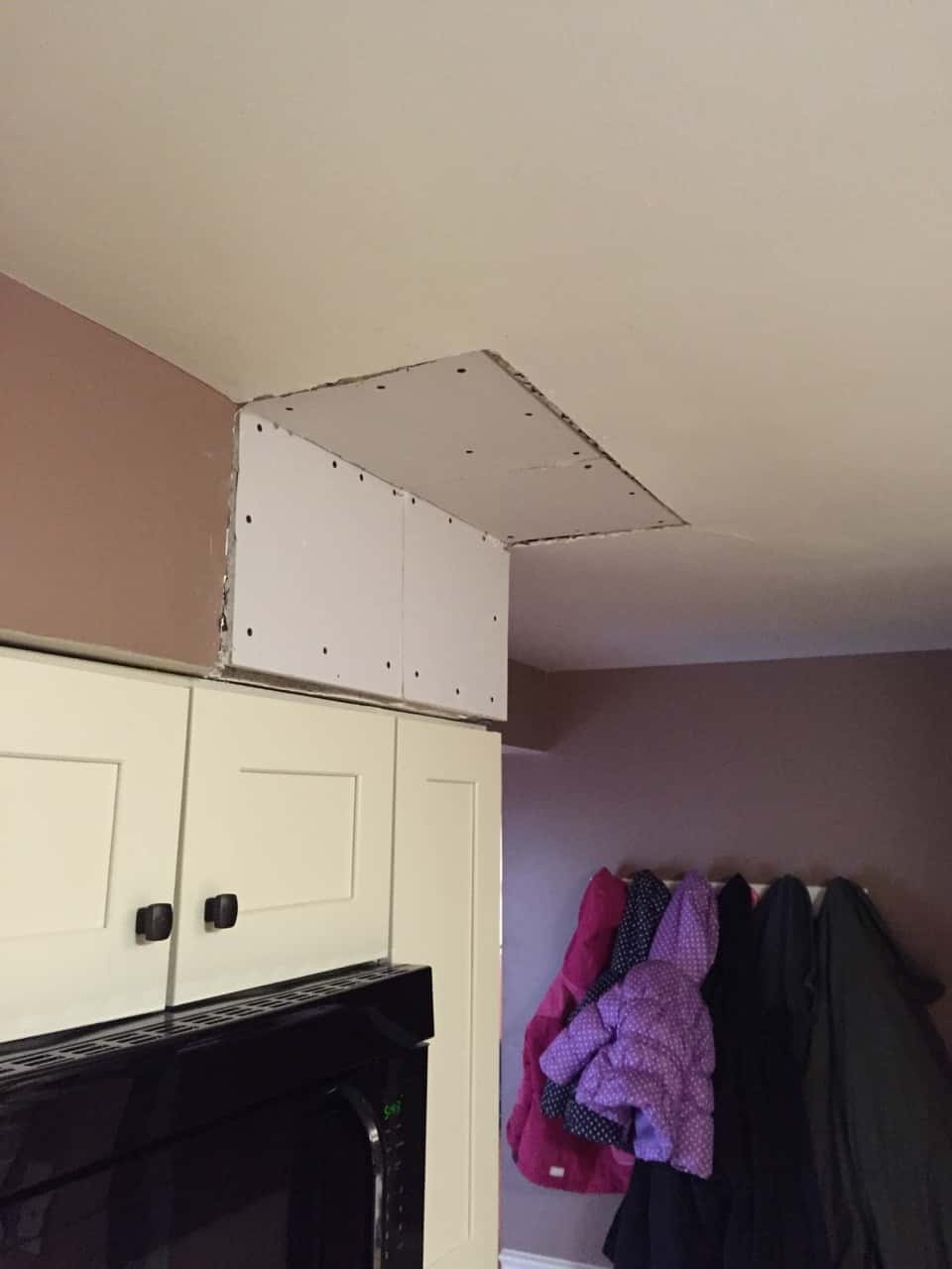 The inexplicable (vestigial?) soffit is gone! Next up is repainting the kitchen.