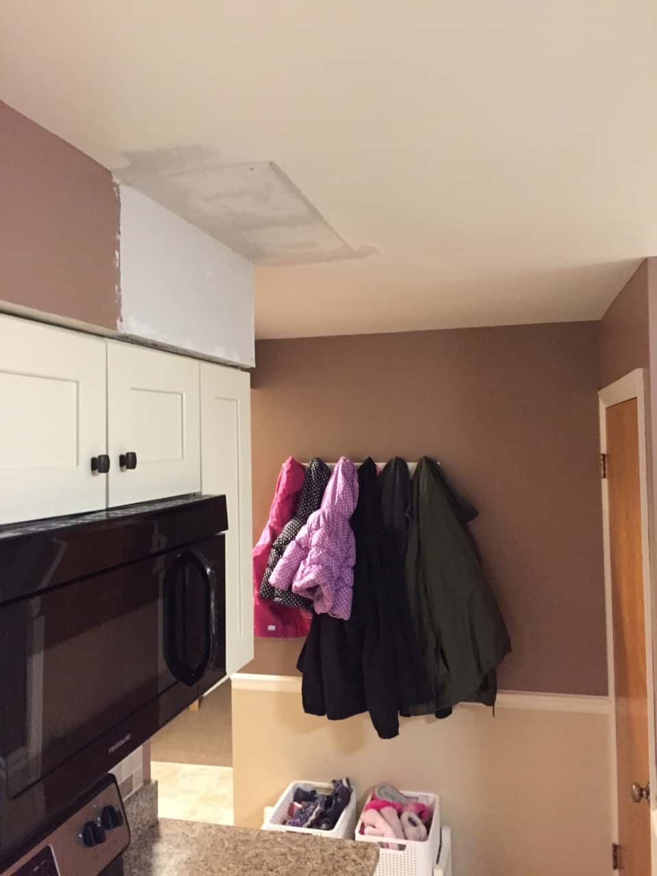 The inexplicable (vestigial?) soffit is gone! Next up is repainting the kitchen.