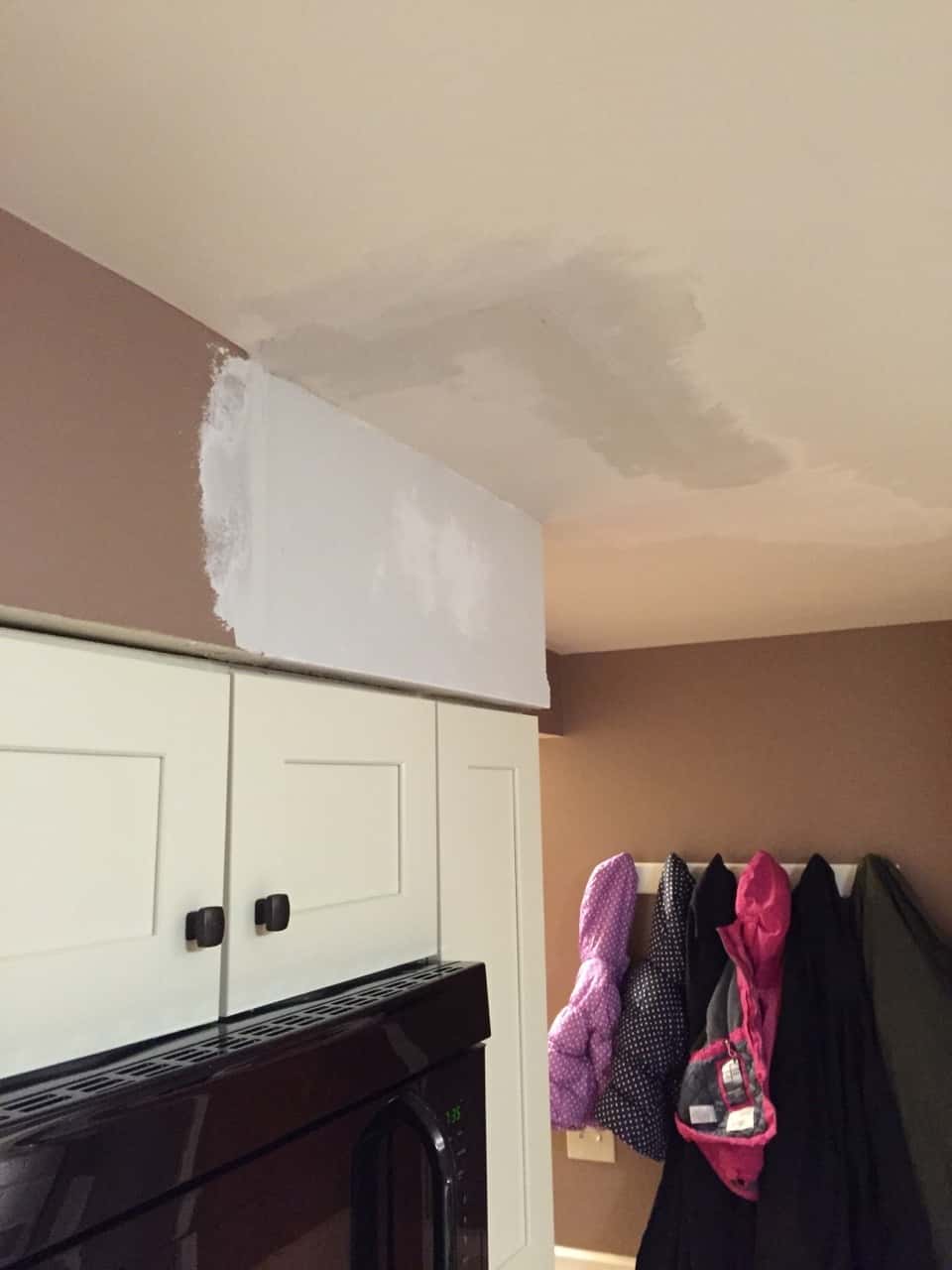 The inexplicable (vestigial?) soffit is gone! Next up is repainting the kitchen.