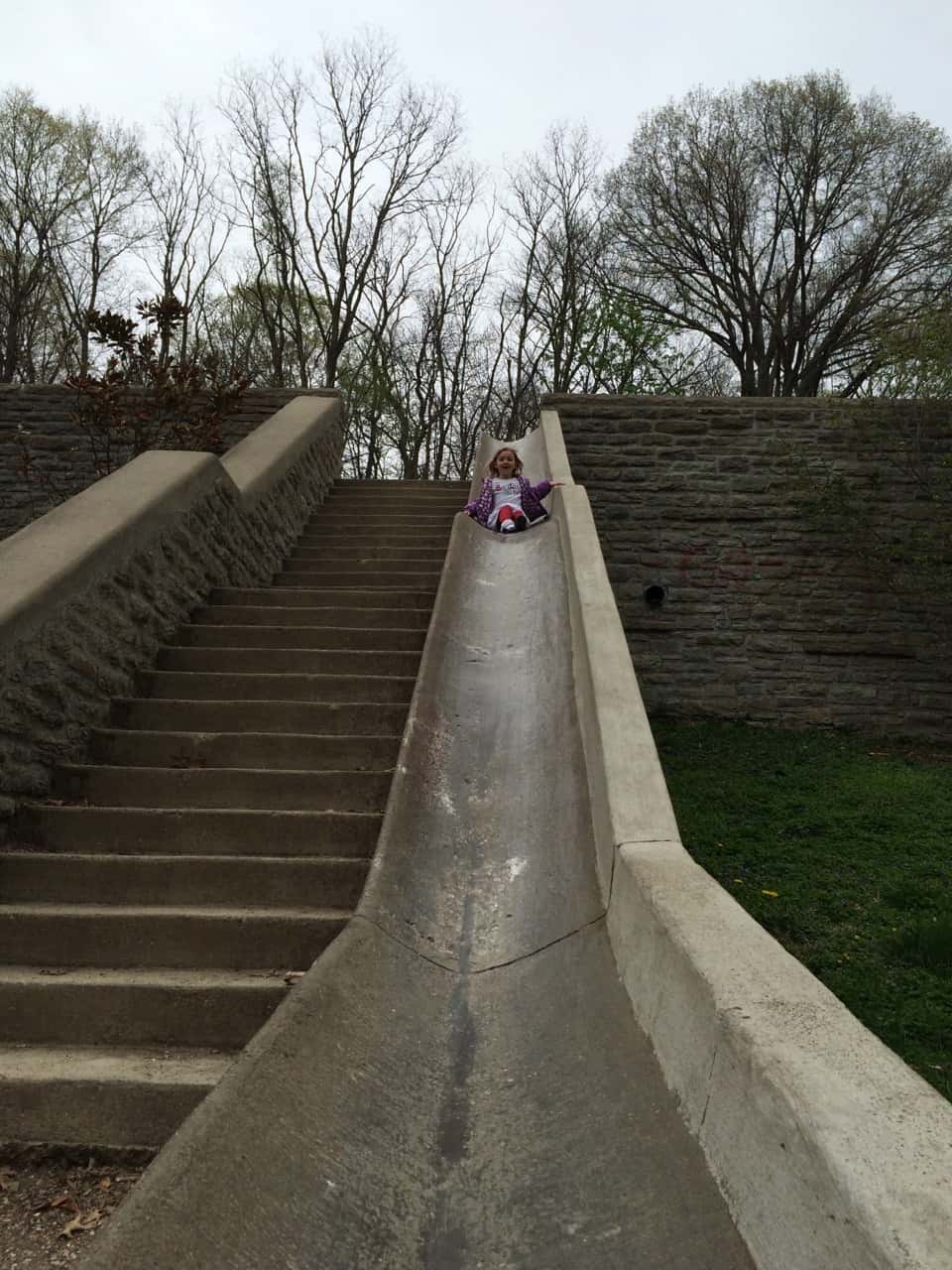 Mark this off the childhood must do list: riding the slide at Burnet Woods. Abby loved it!