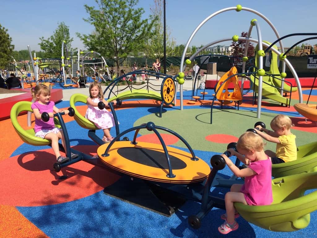It felt like summer today! We got all hot and sweaty with a Madeira Moms playgroup at the new Blue Ash Summit Park. The girls enjoying playing on the awesome (albeit sun-drenched) play structure, swinging on the over-sized porch swings, and doing “tricks” on the great lawn. They capped off the fun by cooling off in their backyard pool. I hope they take great naps because all that sun and excitement sure wore me out!