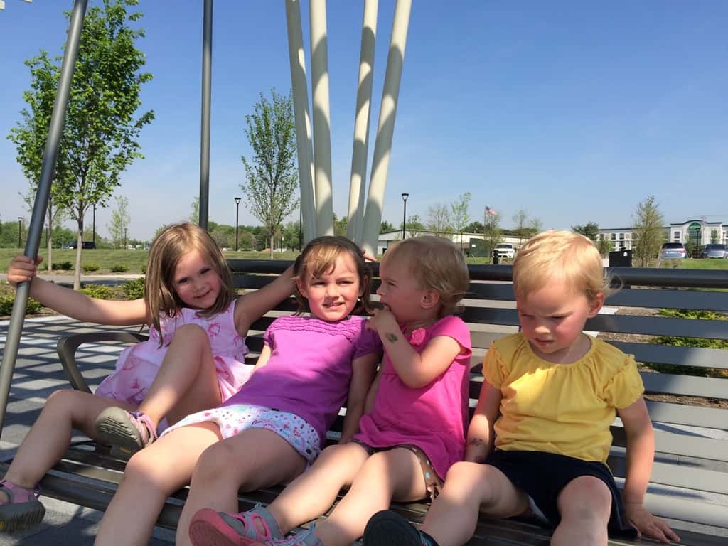 It felt like summer today! We got all hot and sweaty with a Madeira Moms playgroup at the new Blue Ash Summit Park. The girls enjoying playing on the awesome (albeit sun-drenched) play structure, swinging on the over-sized porch swings, and doing “tricks” on the great lawn. They capped off the fun by cooling off in their backyard pool. I hope they take great naps because all that sun and excitement sure wore me out!