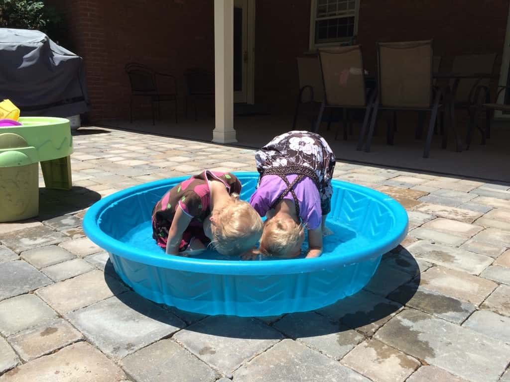Two silly girls, who really like to dunk their faces, cooling off after our twin playgroup today.