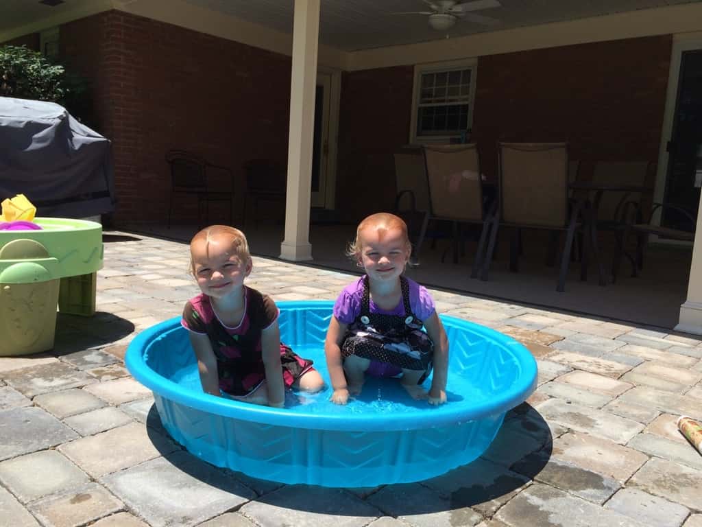Two silly girls, who really like to dunk their faces, cooling off after our twin playgroup today.