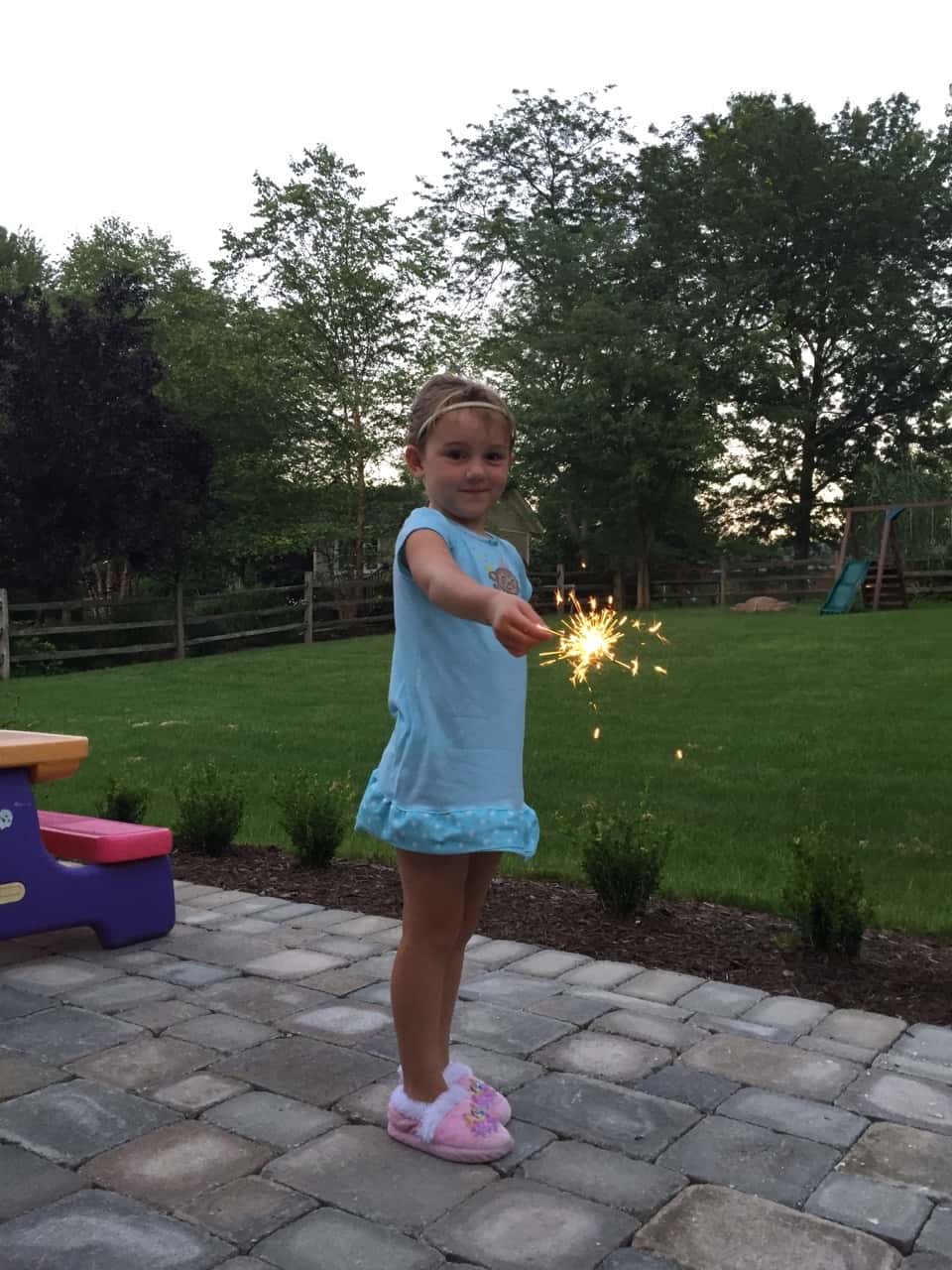 The girls were huge fans of the sparklers, but Gwen did not, no way, want to hold hers.