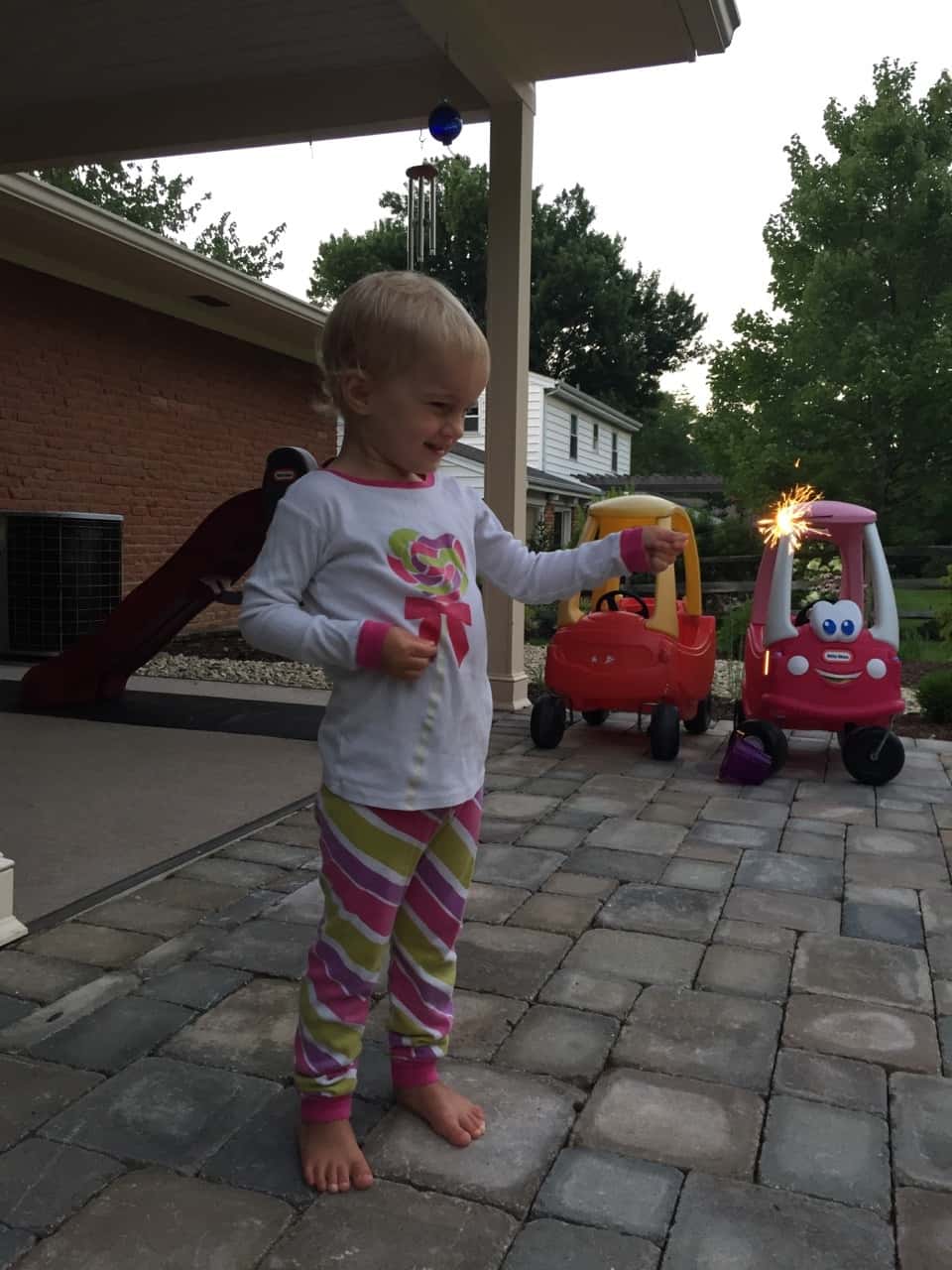 The girls were huge fans of the sparklers, but Gwen did not, no way, want to hold hers.