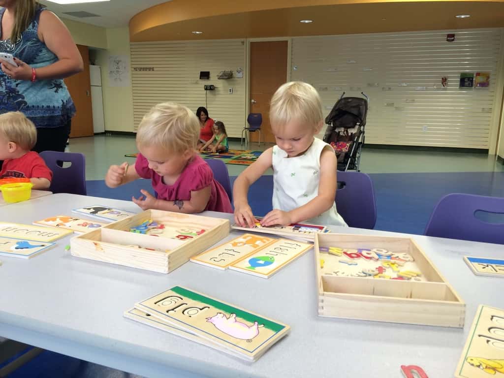 The girls are huge fans of Ms. Amy’s storytime at the Covington Library. I think of it as an hour of free preschool. Just look at the cool things they get to do during activity time.
