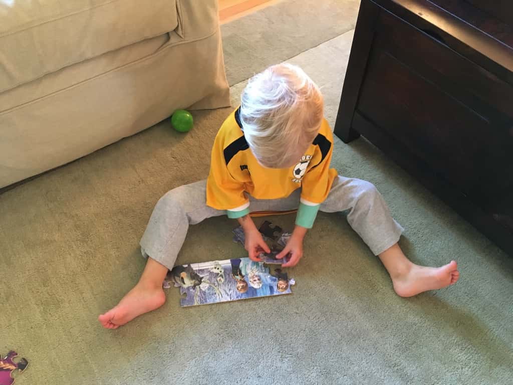 Gwen and Josie decided to work on puzzles today. They each picked one out, pulled the puzzle pieces out of the bags, and got to work. Josie lost interest two seconds later, but Puzzle Master Gwen quickly finished her puzzle by herself and got out another. With some things they are definitely very different little people!