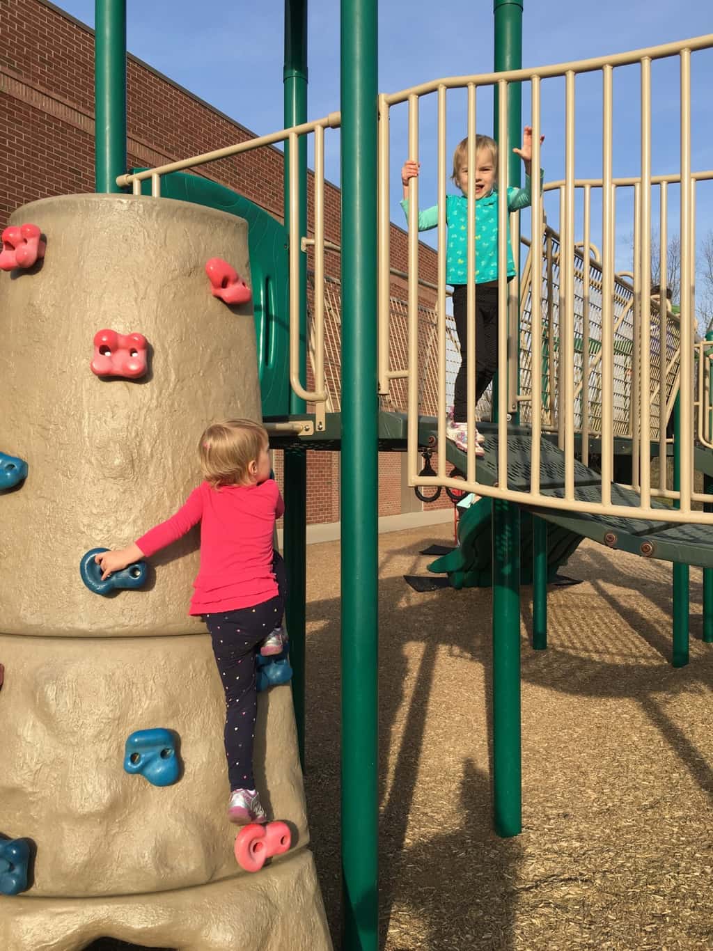 While Abby had soccer practice on the field nearby, Gwen and Josie enjoyed the big kid playground at MES. They also insisted I take pictures of their “tricks.”