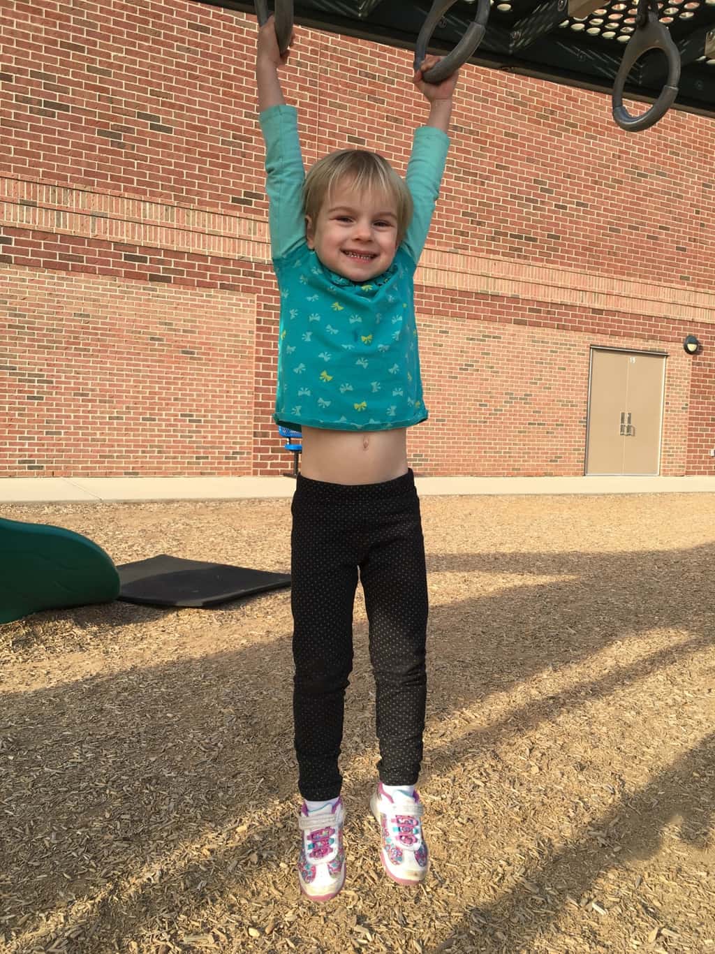 While Abby had soccer practice on the field nearby, Gwen and Josie enjoyed the big kid playground at MES. They also insisted I take pictures of their “tricks.”