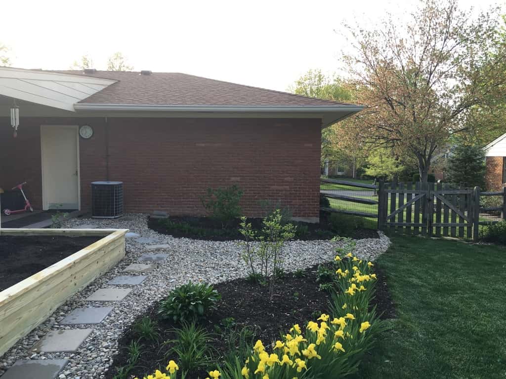 Before and (current) after. This weekend we added two Bloomerang purple lilacs near the garden gate. They were a great find in the clearance plant section at Lowes. These lilac bushes bloom multiple times a year, are deer and mildew restistant, and they only get 5 feet tall! I just hope they tolerate our soil and a little afternoon shade.