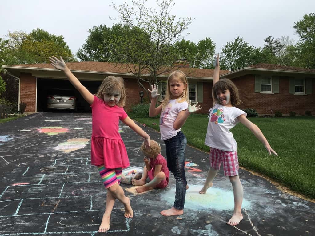They used some of the new chalk for drawing on the driveway.