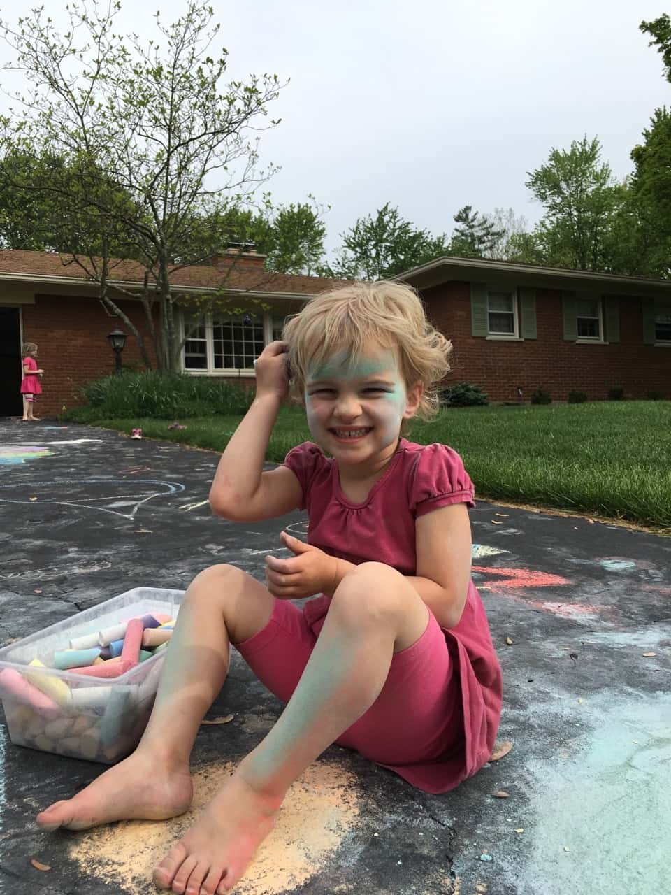 They used some of the new chalk for drawing on the driveway.