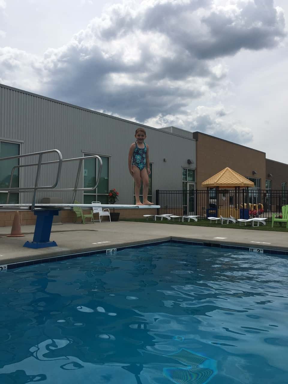 Someone’s list of summer accomplishments keeps growing. First she learned to ride a two-wheeler, then she passed the deep water test at the KHCC pool, and now today she not only passed the deep water test at the JCC, but she also mastered the diving boards! And it’s only week 1 of summer break!
