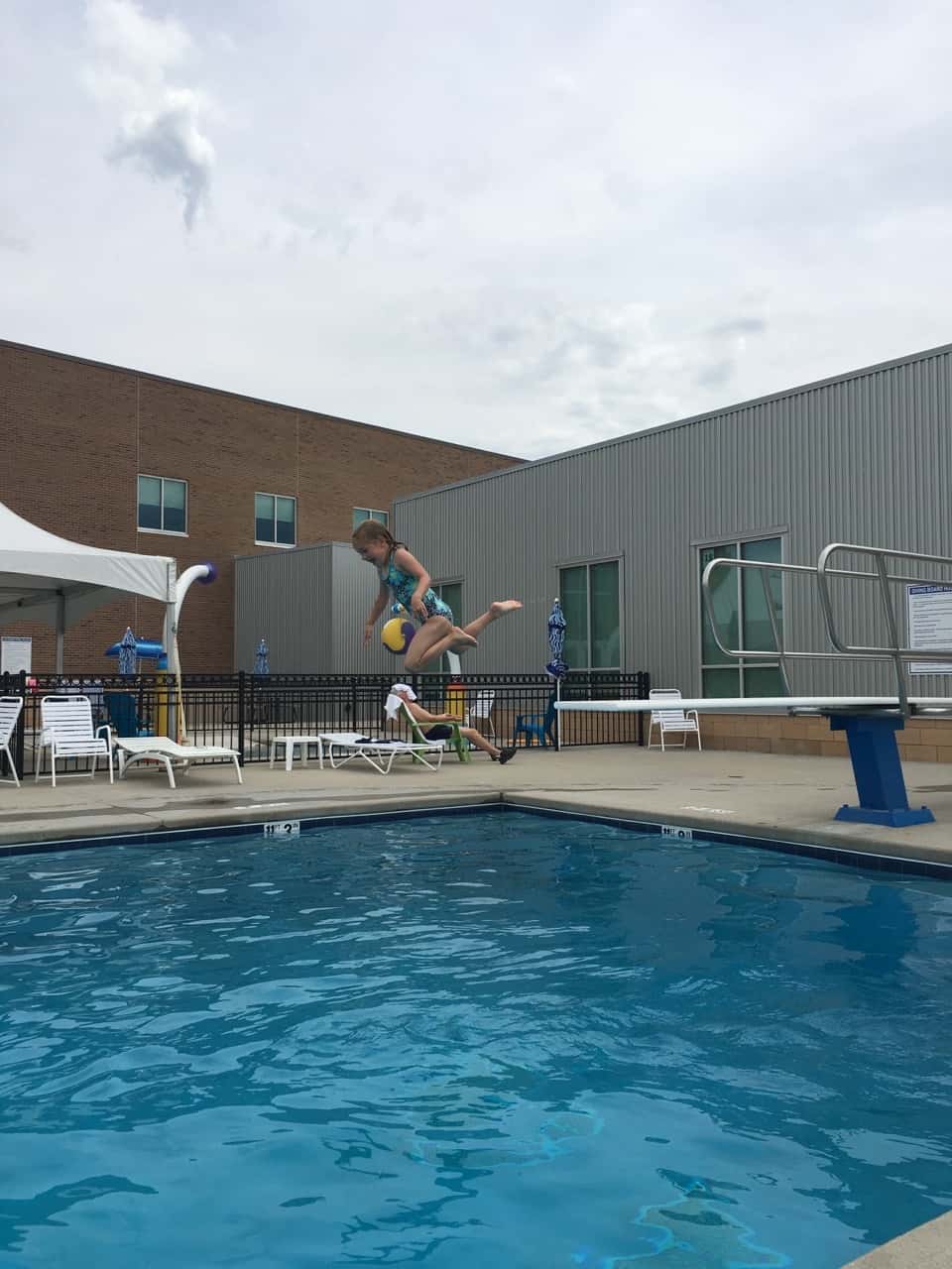 Someone’s list of summer accomplishments keeps growing. First she learned to ride a two-wheeler, then she passed the deep water test at the KHCC pool, and now today she not only passed the deep water test at the JCC, but she also mastered the diving boards! And it’s only week 1 of summer break!