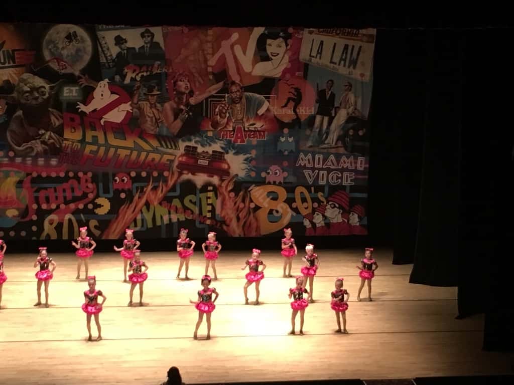 Abby was all smiles and did a wonderful job at her “Totally 80’s” dance recital!
