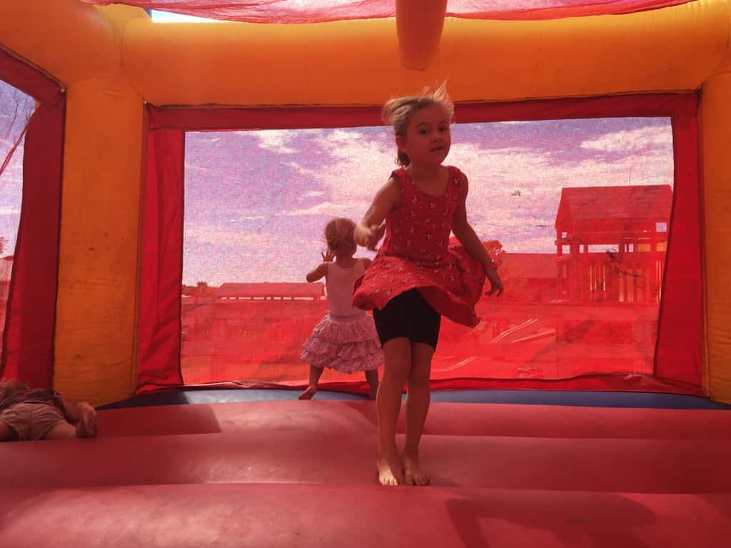 The girls hoped to pick blueberries, but had to settle for bouncing and goat feeding at Hidden Valley Fruit Farm.