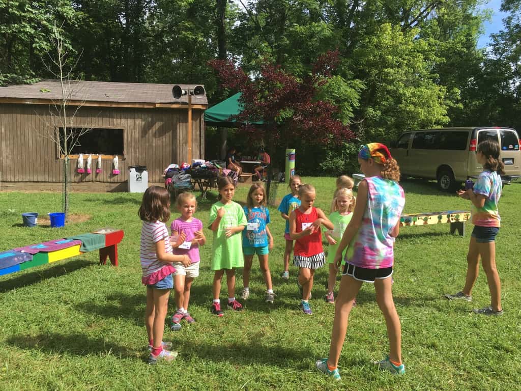 Day four of Girl Scout camp was filled with outdoor art, and science experiments – sun transfers, painting, nature photography, gloop, coke rockets, dancing raisins, static electricity, homemade sorbet. The girls also played a much needed, long game of “drip, drip, drench.”