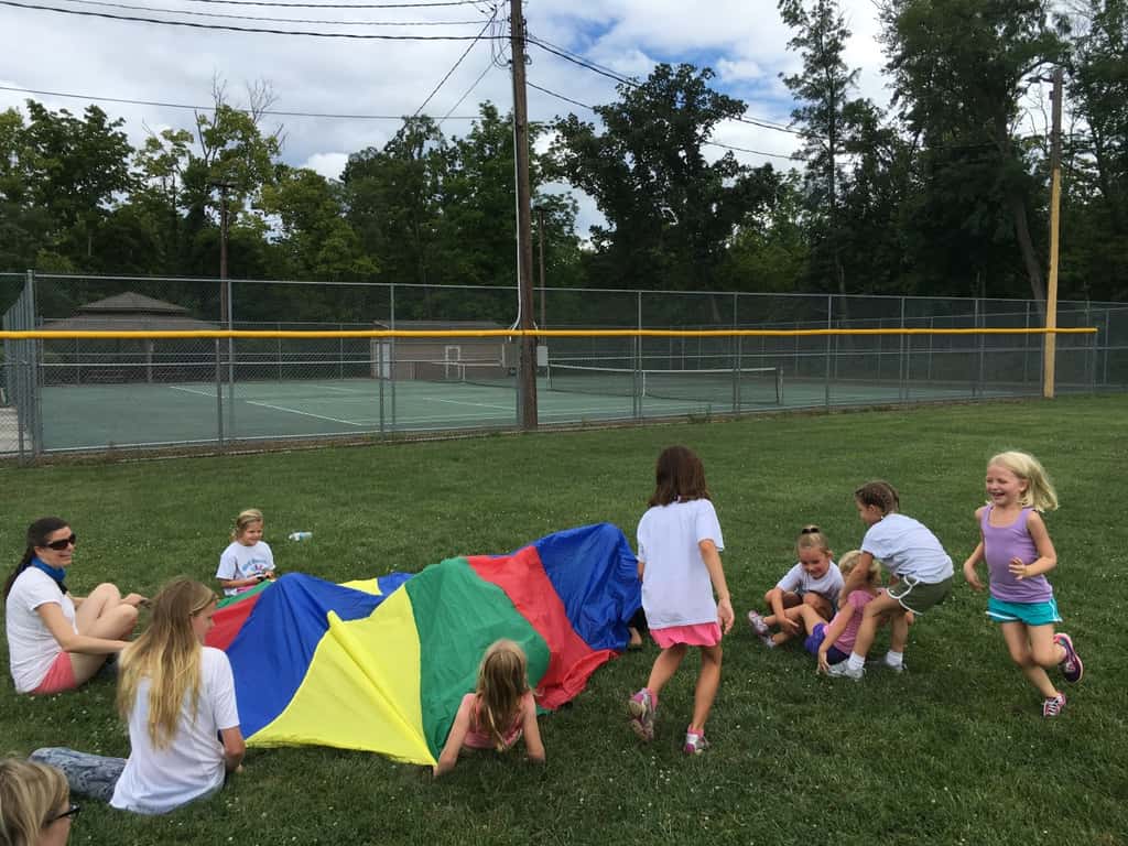 I planned a fun Girl Scout mini-camp for our troop today. We ate sun s'mores, made a photo craft, and played games like “sharks and lifeguards” and “drip drip drench.” (As I type this photo description, I’m wondering how Abby has enough energy to be jumping on the trampoline. I’m wiped out!)