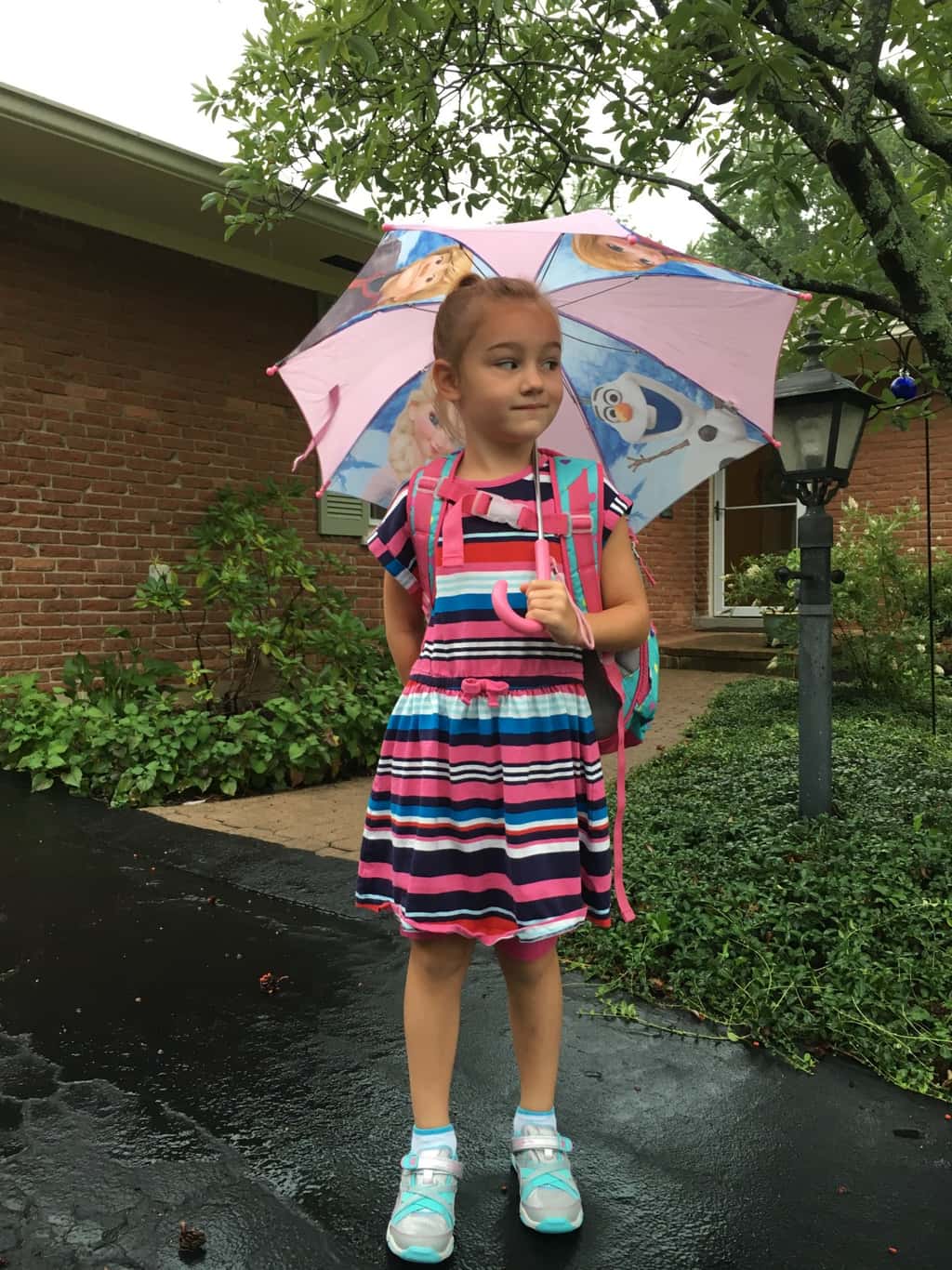 First day of first grade! Even the pouring rain couldn’t put a damper on the excitement at the bus stop this morning.