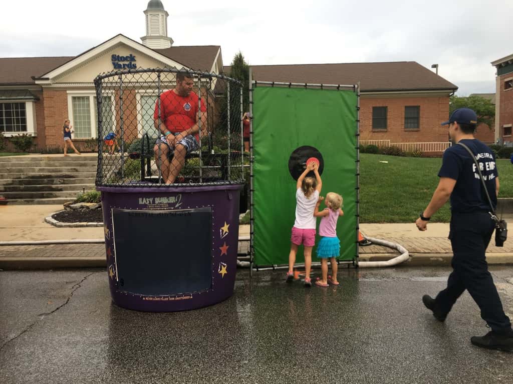 These girls finally got to dunk a firefighter at the Madeira Street Dance! Perhaps their throwing wasn’t quite powerful enough, but their hands sure could push in that target!