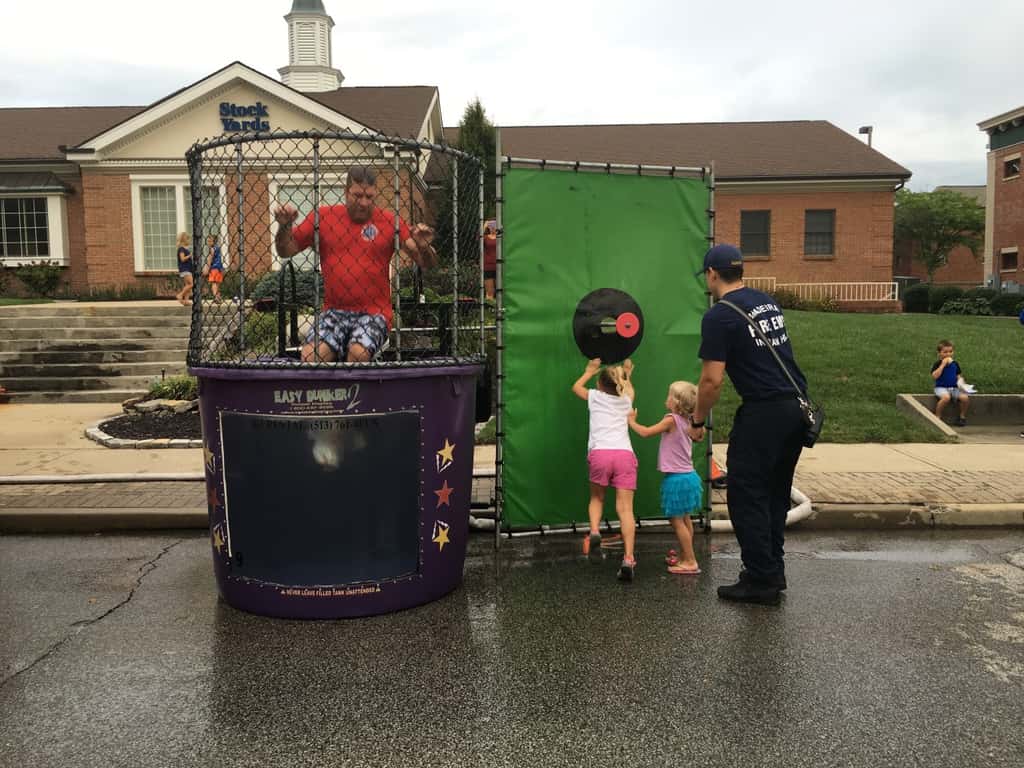 These girls finally got to dunk a firefighter at the Madeira Street Dance! Perhaps their throwing wasn’t quite powerful enough, but their hands sure could push in that target!