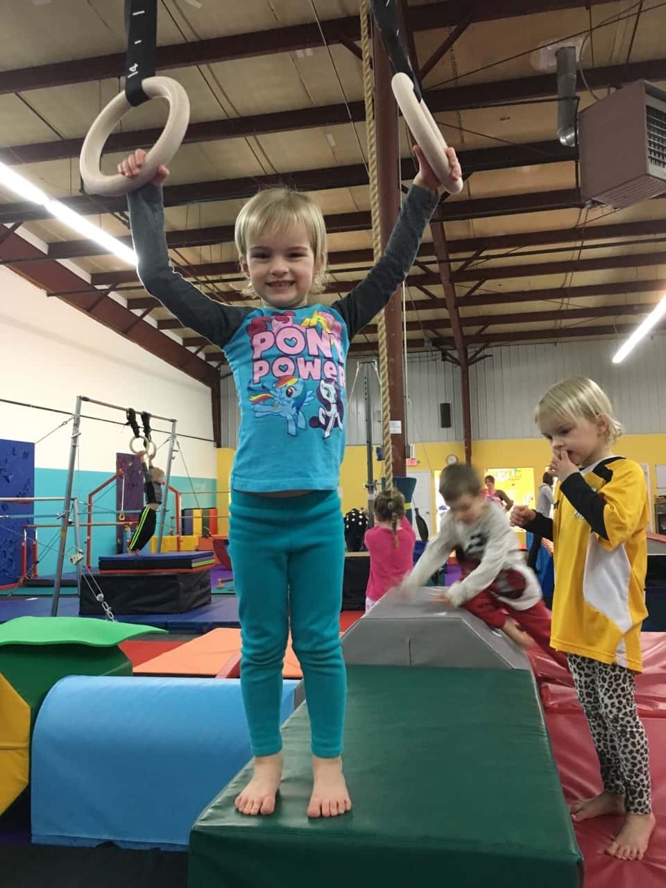 The girls love that our preschool playgroup keeps meeting at Gym Skills.
