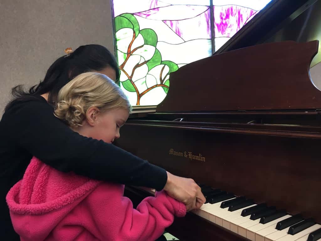 Gwen sat on my lap, but Josie boldly participated in the Peanut Butter and Jam concert today.