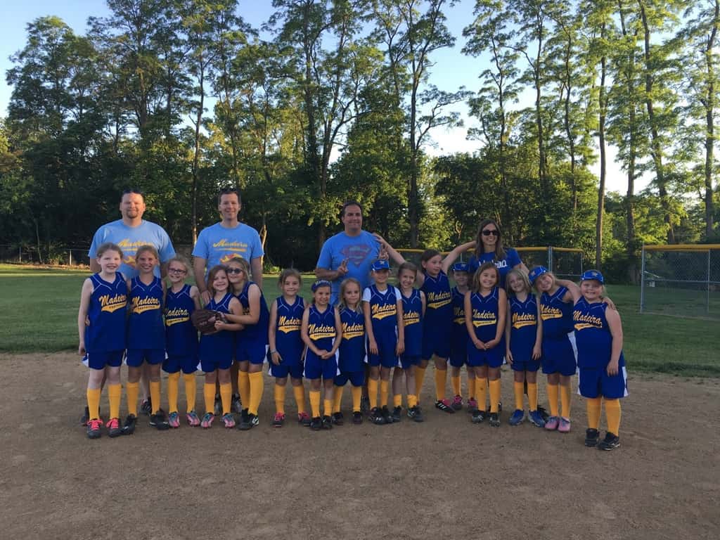 The “Pink Fluffy Curly Mustangs with Mustaches” aka Abby’s softball team and their awesome coaches