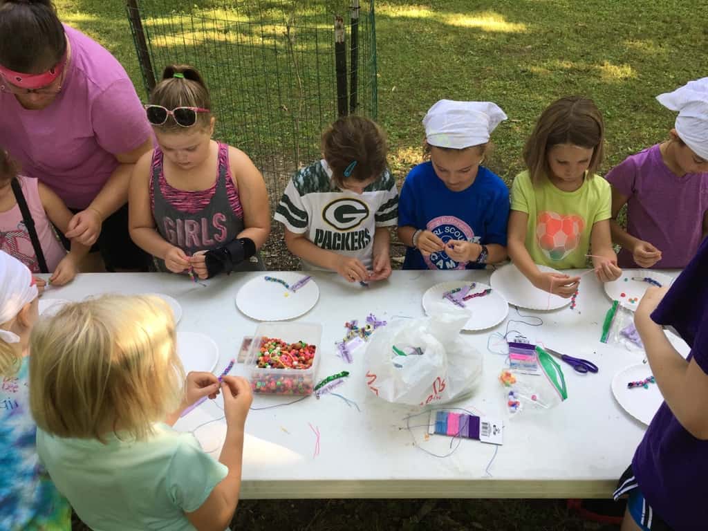 It’s unbelievable that tomorrow is already our halfway point for “Camp Hogwoods” Girl Scout Camp at French Park! So far, we’ve hiked, walked through the creek, played with clay, tie-dyed t-shirts, played games like Drip Drip Drench, watched a magic show, decorated banners and bandanas, performed friendship skits, sent PAs to Azkaban, gone on a scavenger hunt, visited with Zoo animals, made SWAPS, learned first aid skills, and more! It’s been a busy, but fun week.