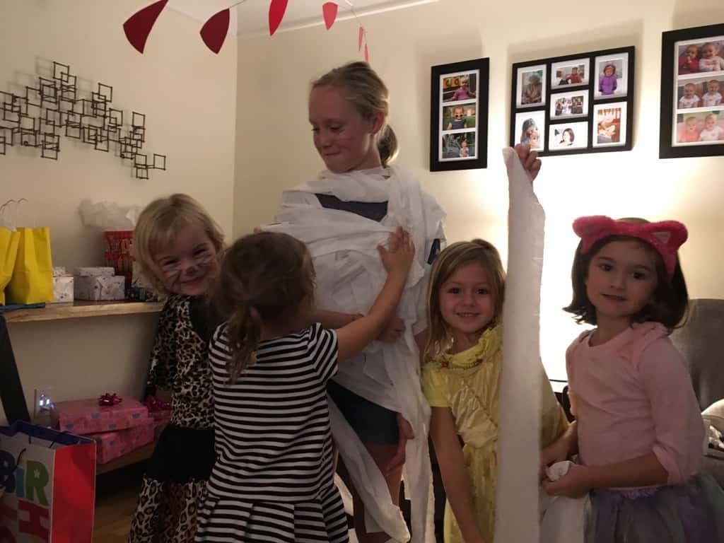 Gwen and Josie loved making slime, competing in a mummy race, and decorating cupcakes with friends at their 5th birthday costume party.